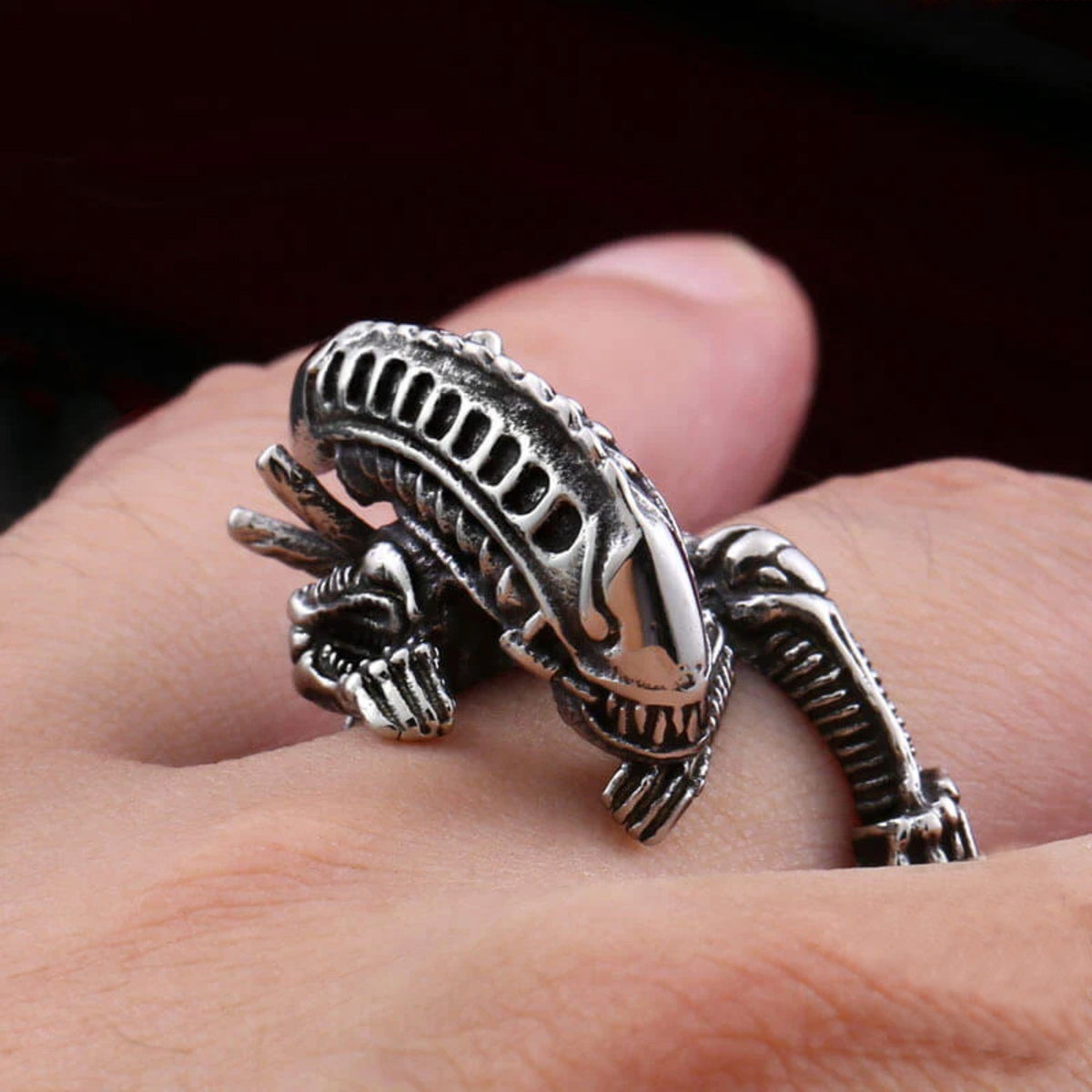 Alien Xenomorph stainless steel ring on finger